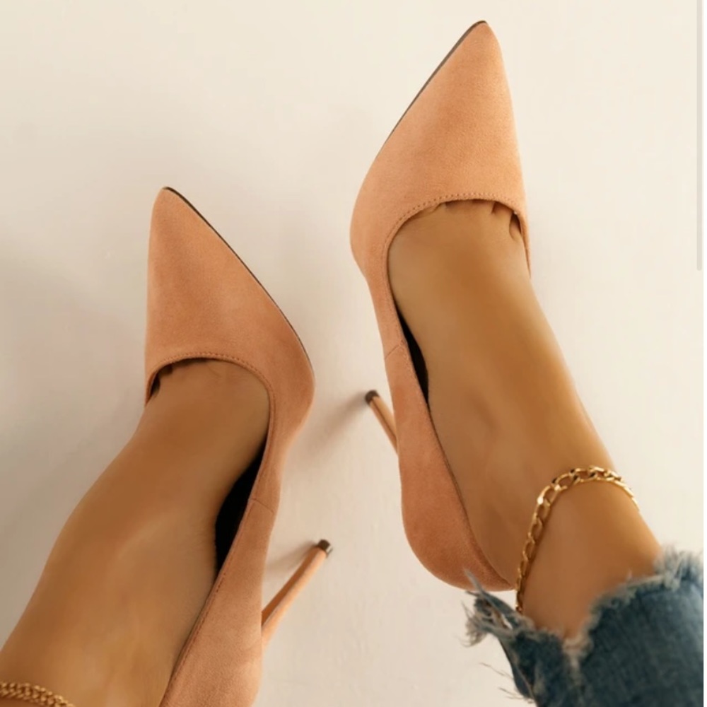 Nude colored suede pumps